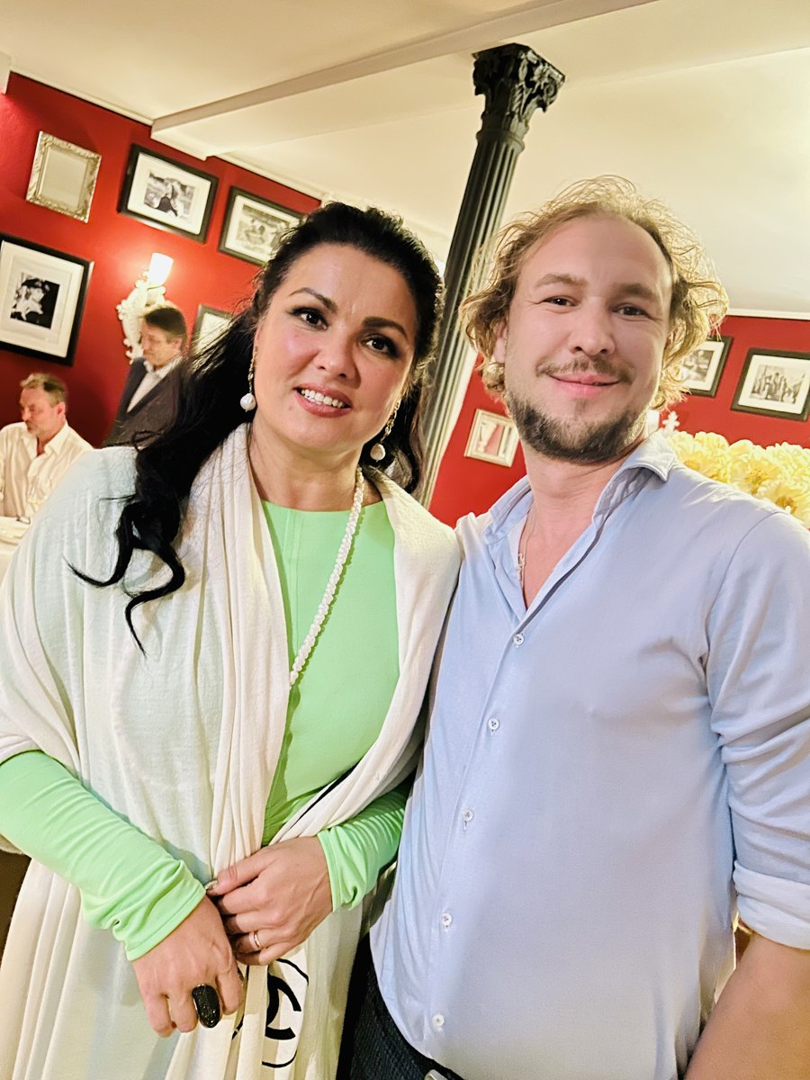 Vlad Krik with an opera soprano at a reception